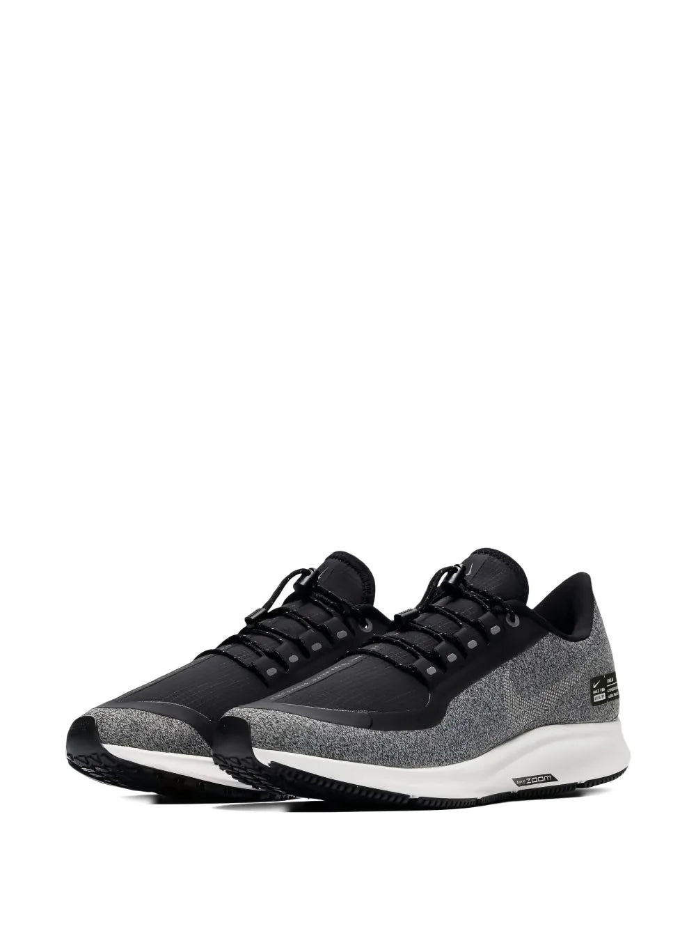 Nike men's running shoe, black and gray knit upper, lace-up, white curved sole