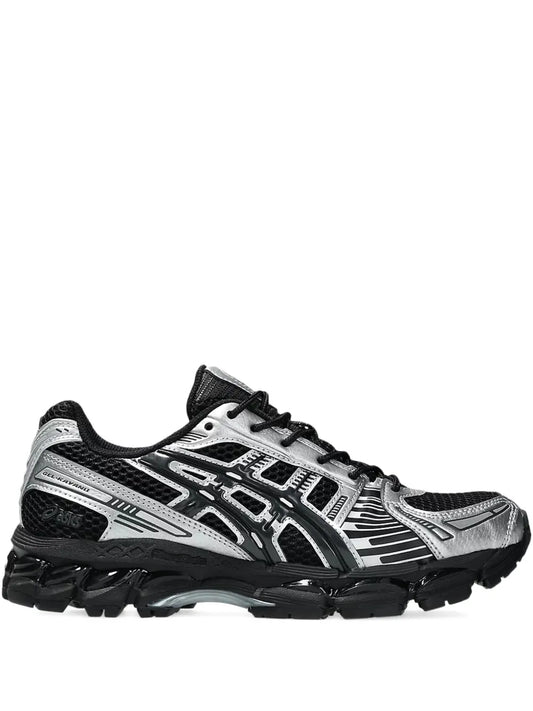 ASICS lace-up running shoe with black mesh upper, silver accents, and chunky sole
