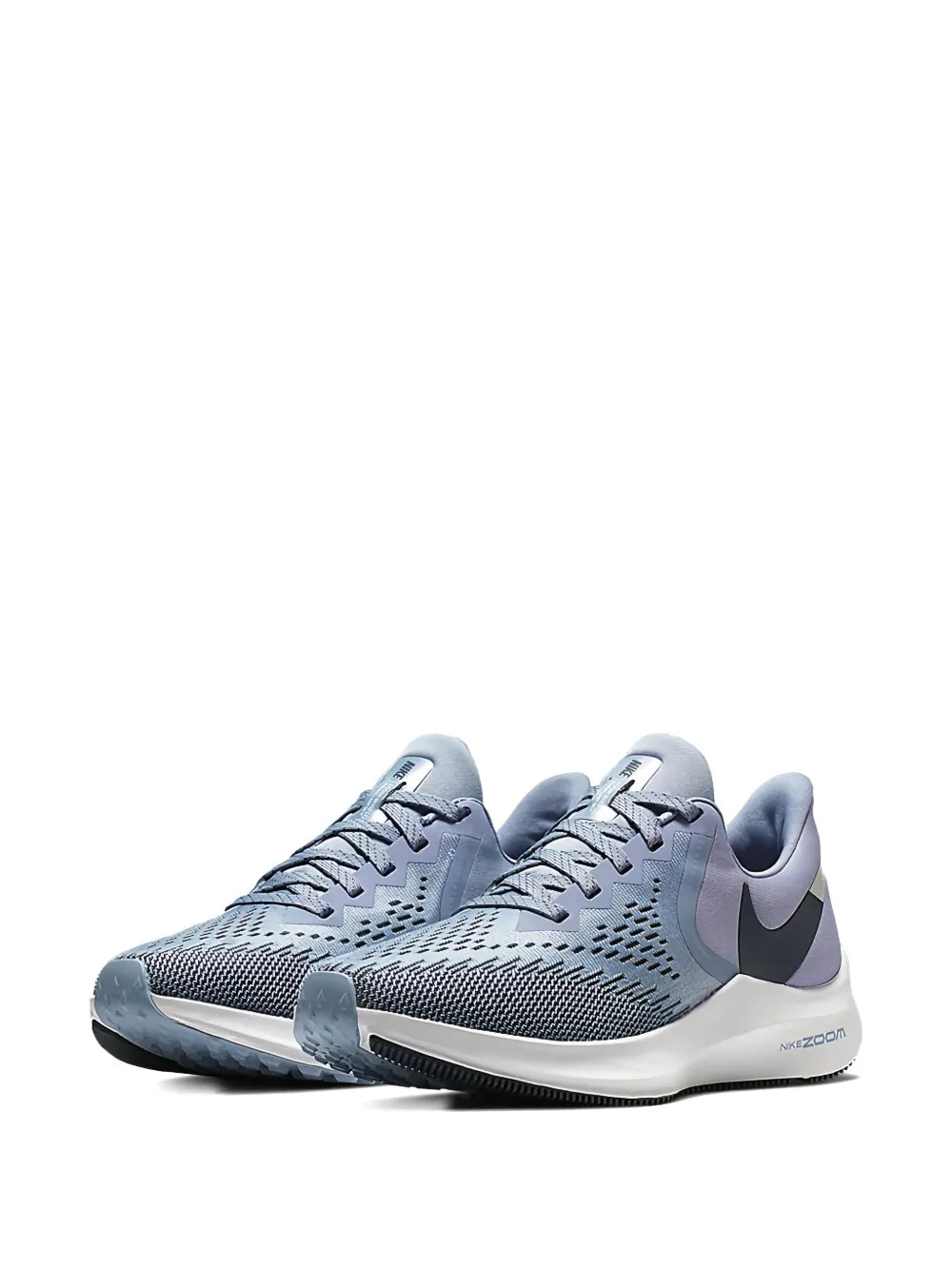 Blue lace-up running shoes with Nike swoosh and knit upper, cushioned sole