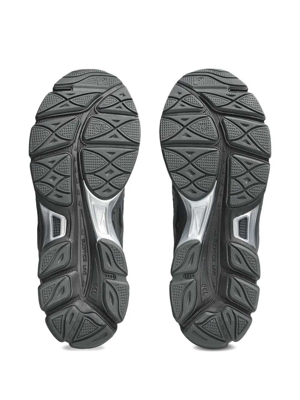 Black running shoes outsoles, textured rubber tread with side traction