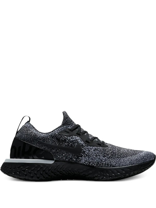 Nike black flyknit running shoe with knit upper, laces, and visible Swoosh