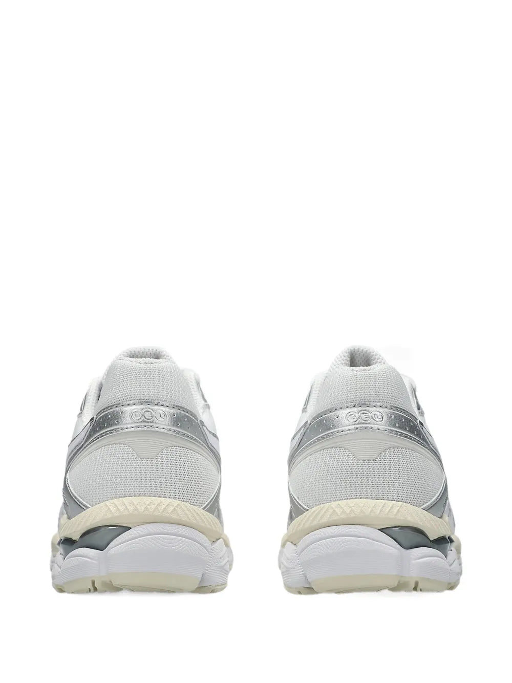 Running sneakers with white mesh upper, heel tabs, and cushioned beige sole