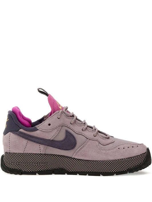 Nike Air Force 1 low-top sneakers, light gray with purple accents and black outsole.