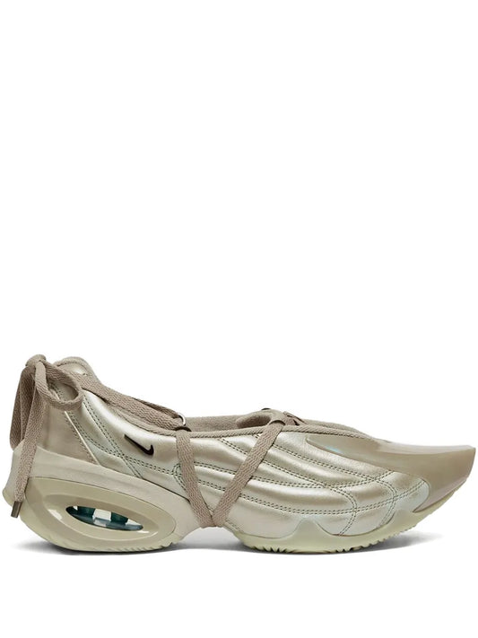 Beige Nike Air Max Muse sneakers with lace-up closure and visible Air sole unit