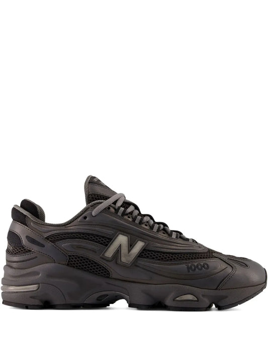 Black New Balance 1000 mesh overlay sneaker, side profile with lace-up design