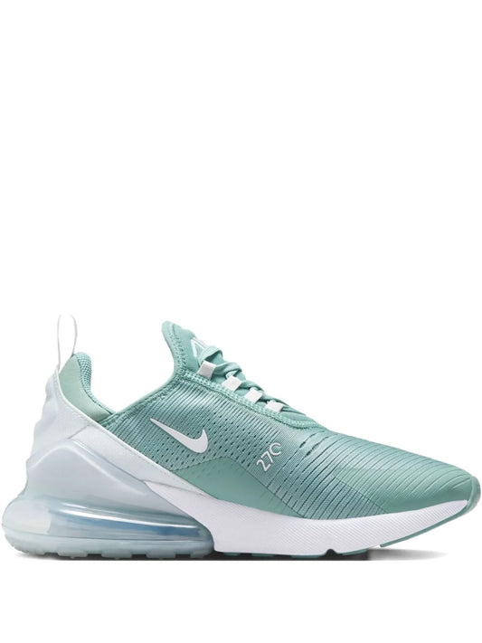 Green knit sneakers with lace-up and Nike swoosh; visible Air-cushion sole