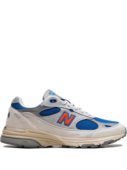 New Balance 993 grey lace-up sneakers with blue panels and orange N logo