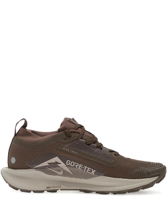 Brown lace-up trail shoe with Gore-Tex and Nike logo
