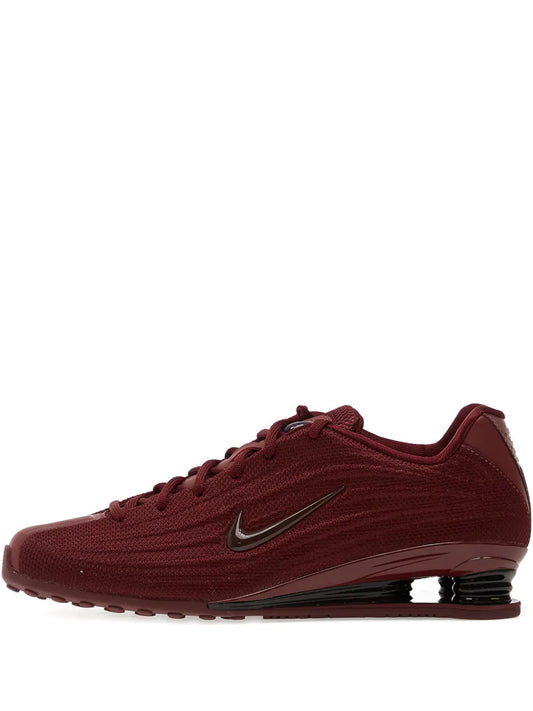 Nike Shox Z lace-up sneaker in dark red with Nike swoosh and visible air-cushion heel