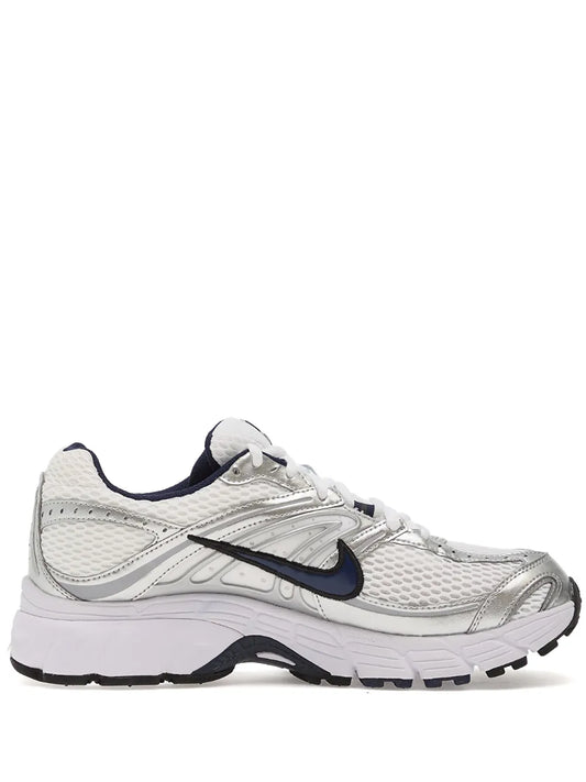 Nike Air Max Moto 2K white mesh sneaker with navy swoosh and black sole