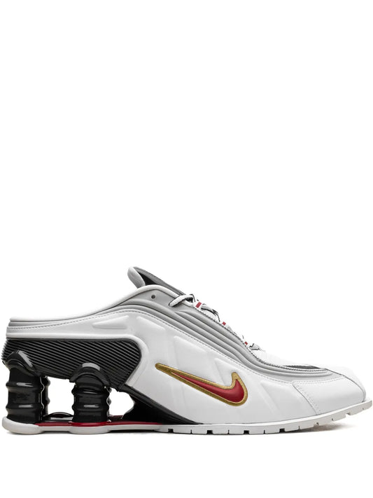 White Nike Shox MR4 sneaker, red-yellow Swoosh, black air pod outsole