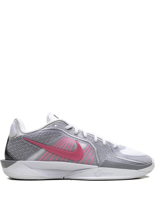 Grey textured basketball sneaker with pink swoosh, white laces and white midsole
