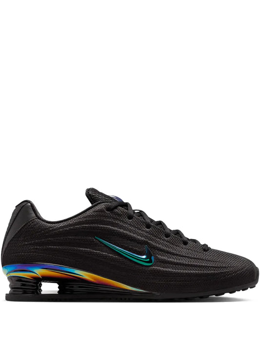 Nike Shox Z black lace-up running shoe with teal swoosh and rainbow midsole
