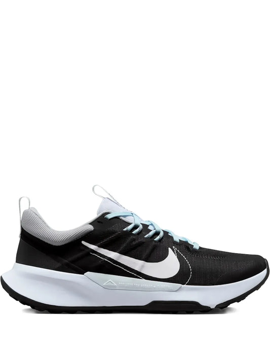 Nike trail running shoe, black knit upper with white midsole and light blue accents