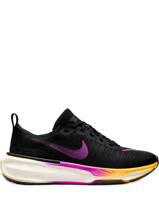 Nike Zoomx Invincible 3 running shoes, black knit upper with purple swoosh, white and yellow sole