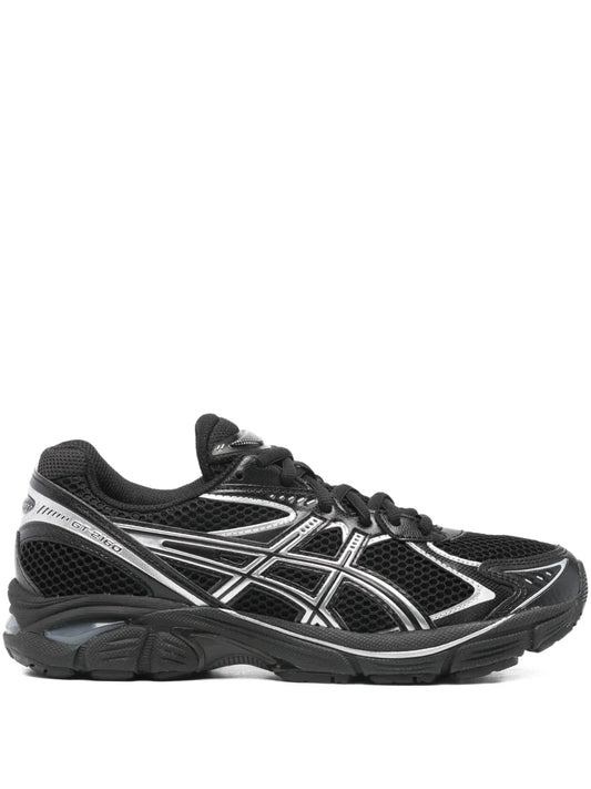 Black ASICS GT-2160 running sneakers with silver accents and mesh upper