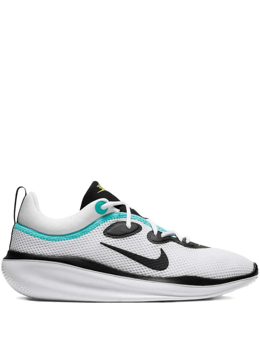 White Nike running sneaker with black and teal accents, swoosh and lace-up