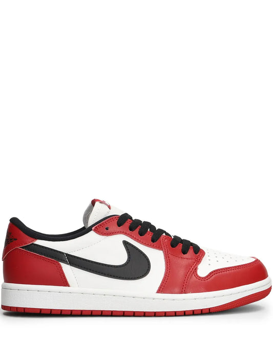 Low-top leather sneaker in white, red, and black with Nike swoosh