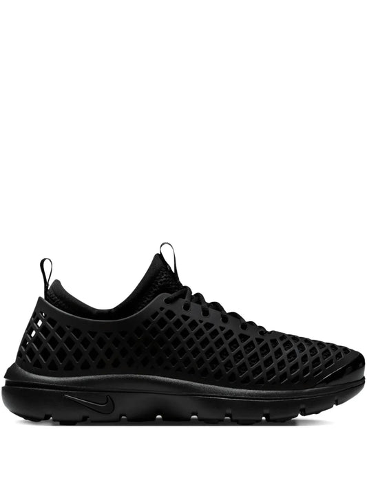 Black Nike lace-up athletic shoe with textured mesh upper and molded sole