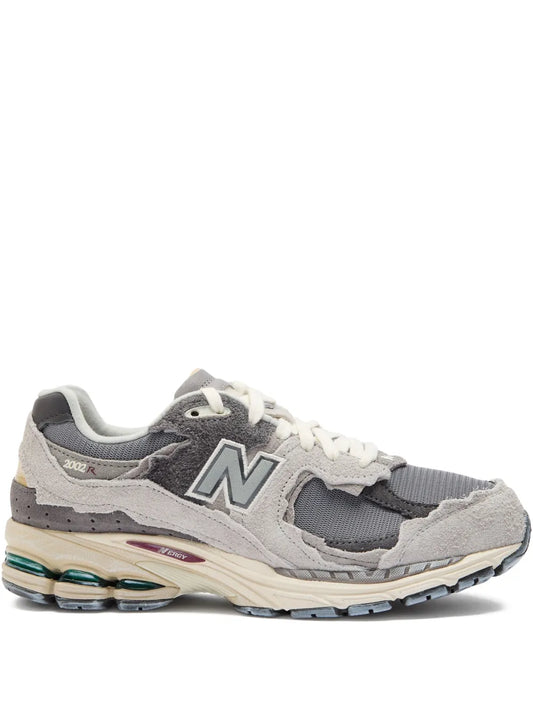 New Balance 2002R grey running sneaker with white laces and cushioned sole