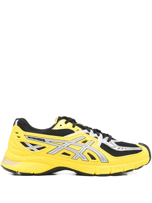 ASICS yellow and black lace-up running shoe with white logo and panel accents