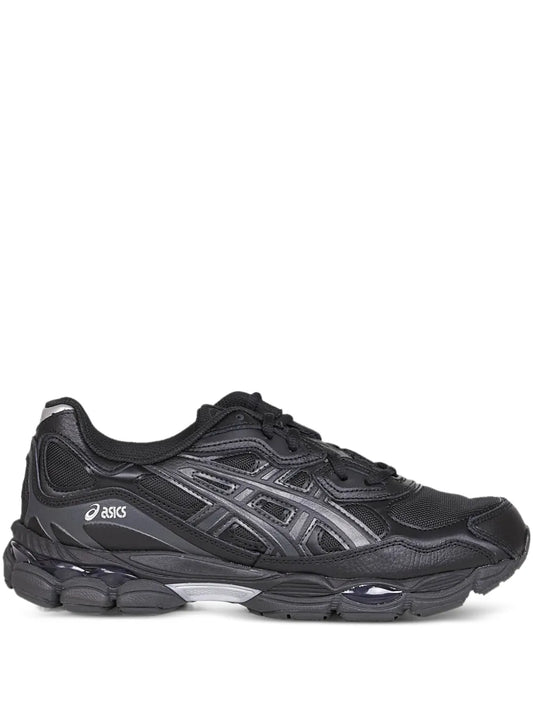 Black lace-up sneakers with ASICS logo and patterned panels