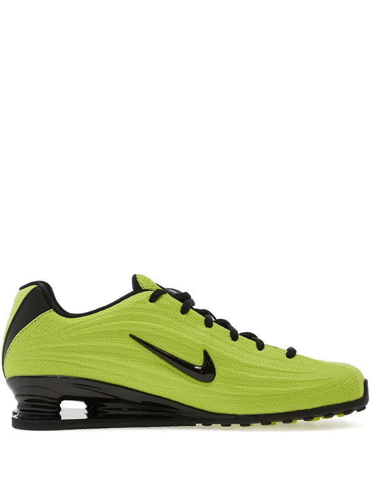 Nike Shox Z lime green running shoes with black Swoosh and lace-up design