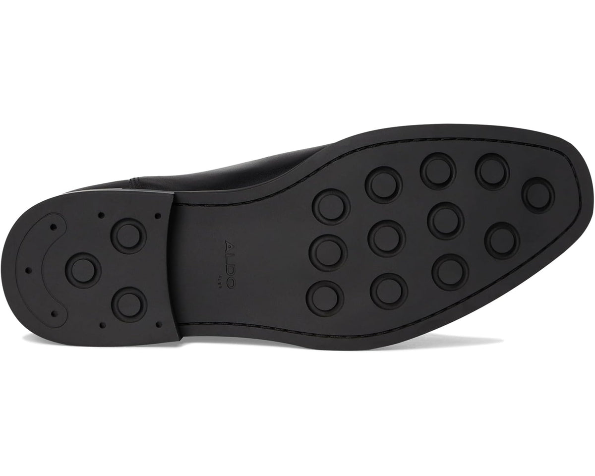 Men's black chelsea boot rubber sole with tread pattern and heel