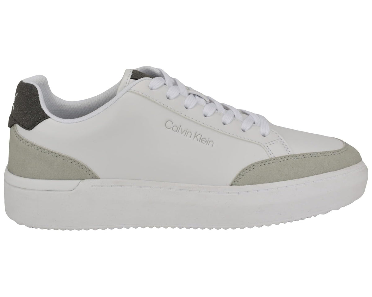 Light grey low-top sneakers with beige panels and white laces