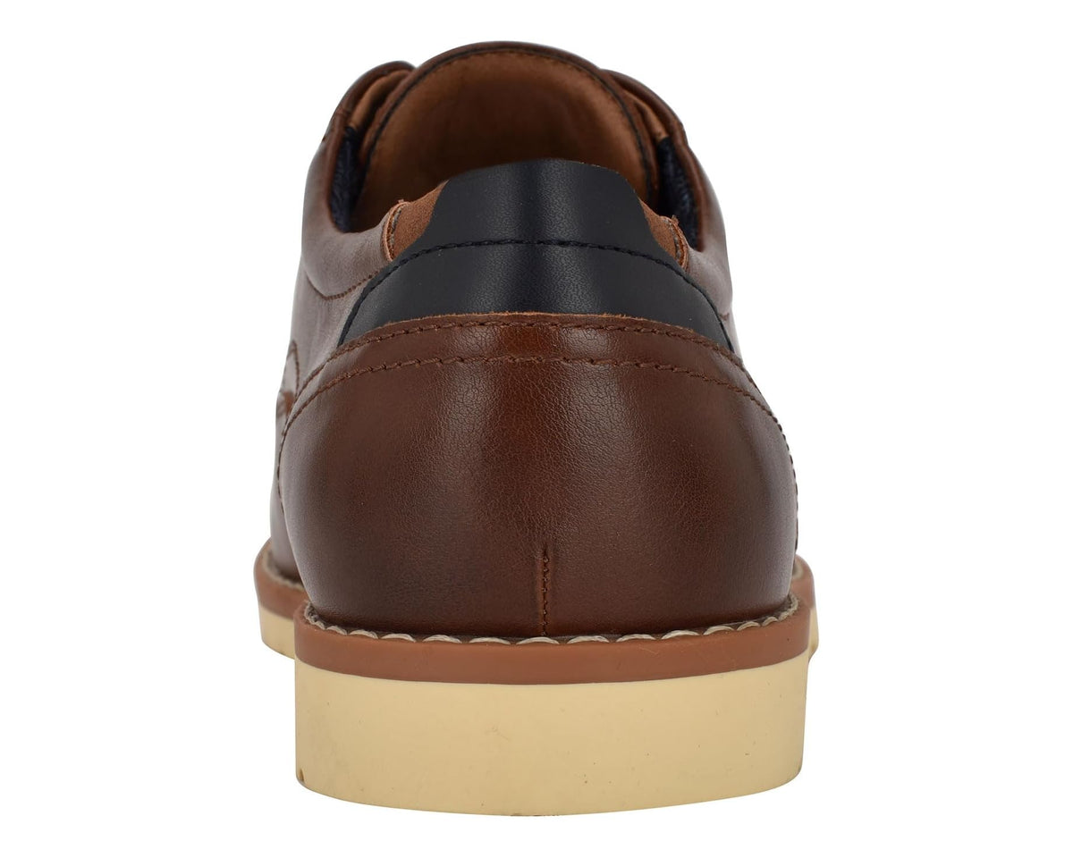 Cognac leather lace-up shoe heel with stitched apron and dark collar lining