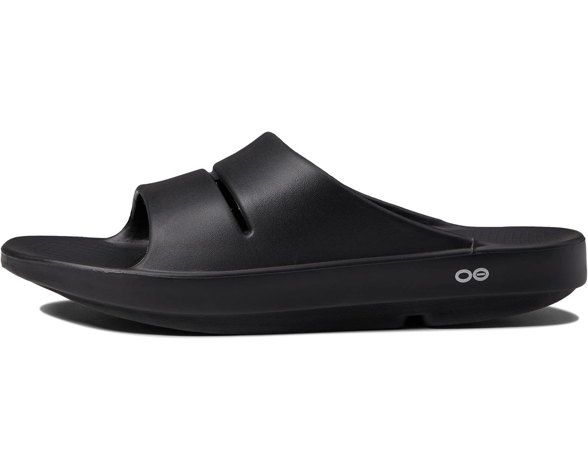 Black OOahh slide sandal side view with contoured footbed and strap detail