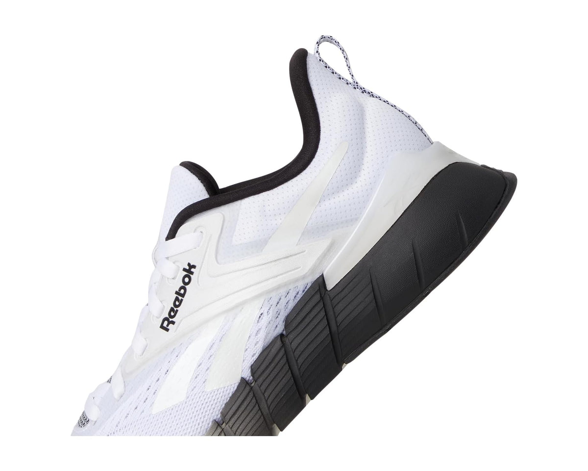 Reebok Nano side view, white upper with black forefoot panel and rubber tread