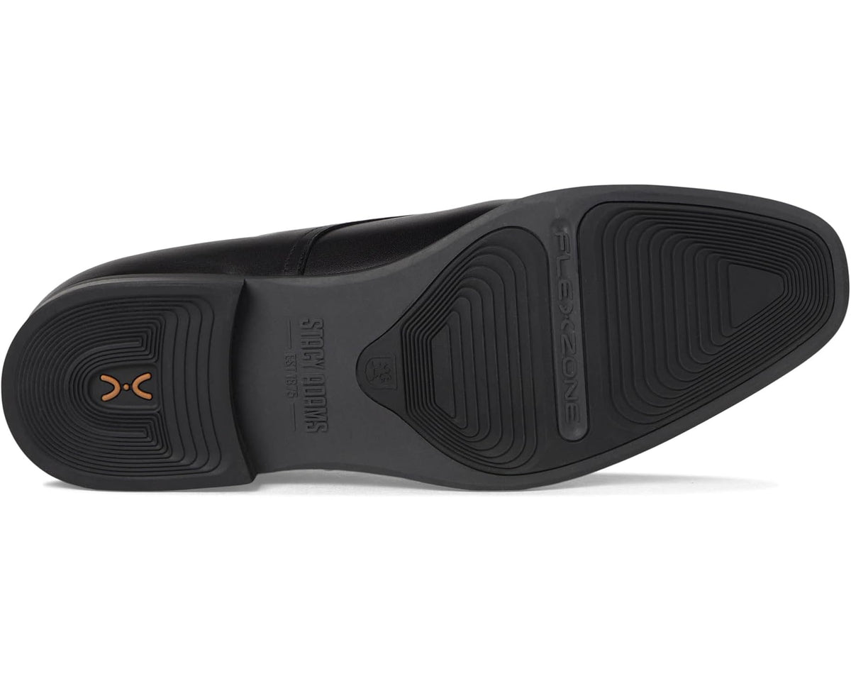 Black rubber outsole with patterned tread for traction.