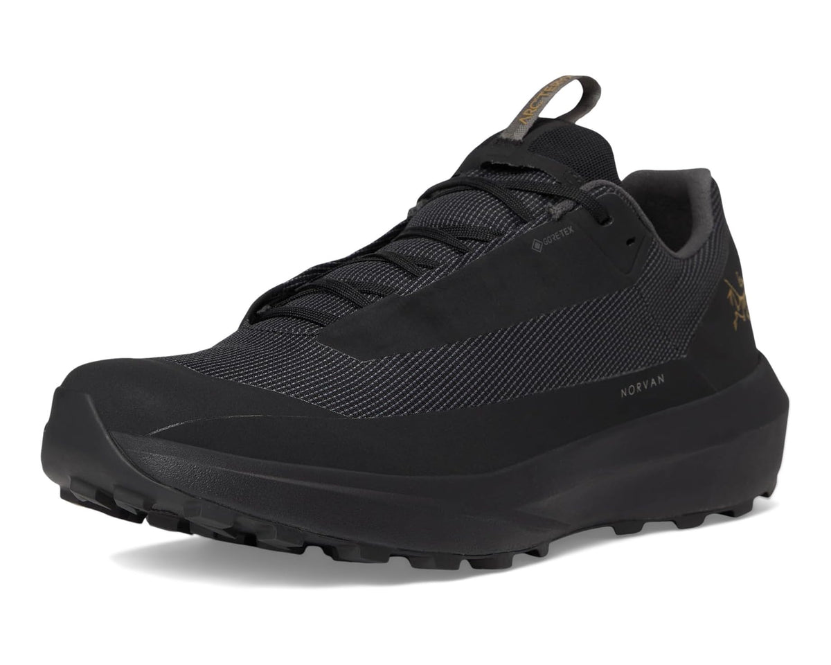 Unisex black trail running shoe with lace-up front and textured upper