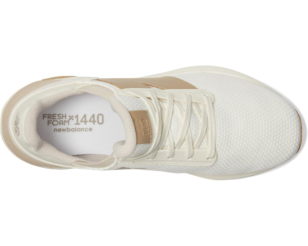 Men's New Balance Fresh Foam X 1440 shoe interior view, white upper with tan heel tab