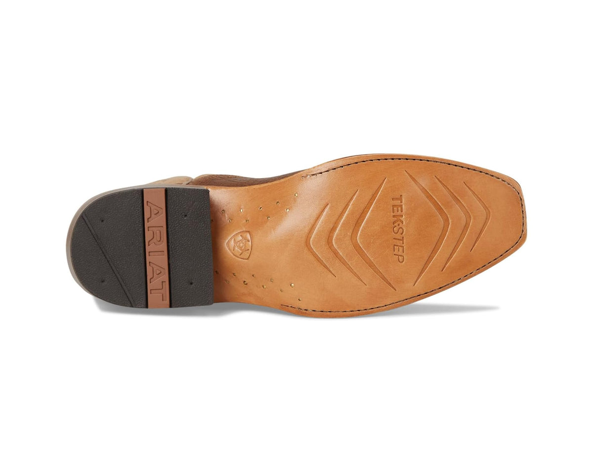Tan boot outsole with black heel insert and ridged tread