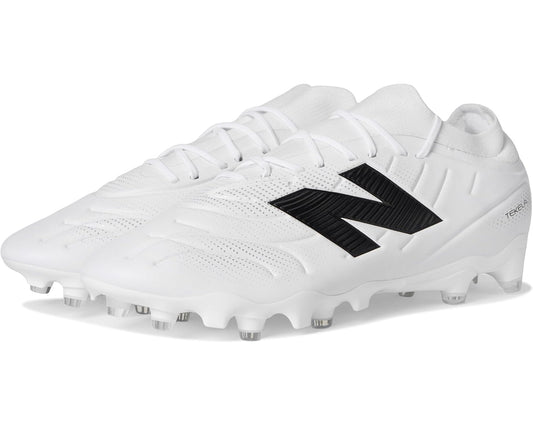 White/black New Balance Tekela low laced FG soccer cleats with studded outsole
