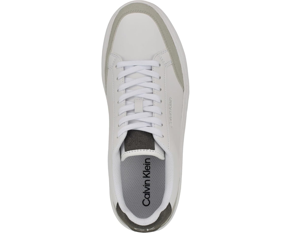 Low-top sneaker top view, white laces, Calvin Klein text on tongue