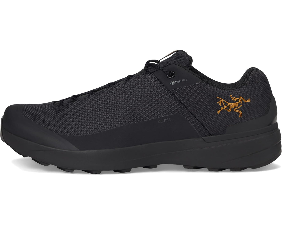 Unisex Arc'teryx Kopec GTX black low hiking shoes, lace-up with yellow logo