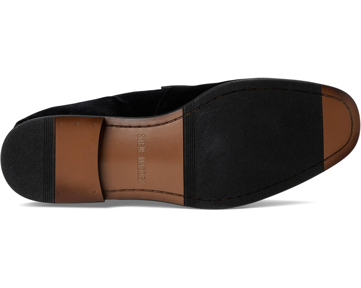 Black suede loafer outsole with tan welt and traction tread