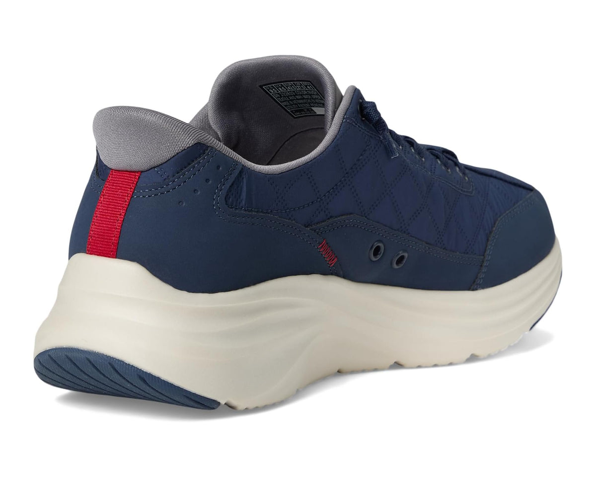 SKECHERS navy sneaker heel with red pull tab, grey lining, and white midsole
