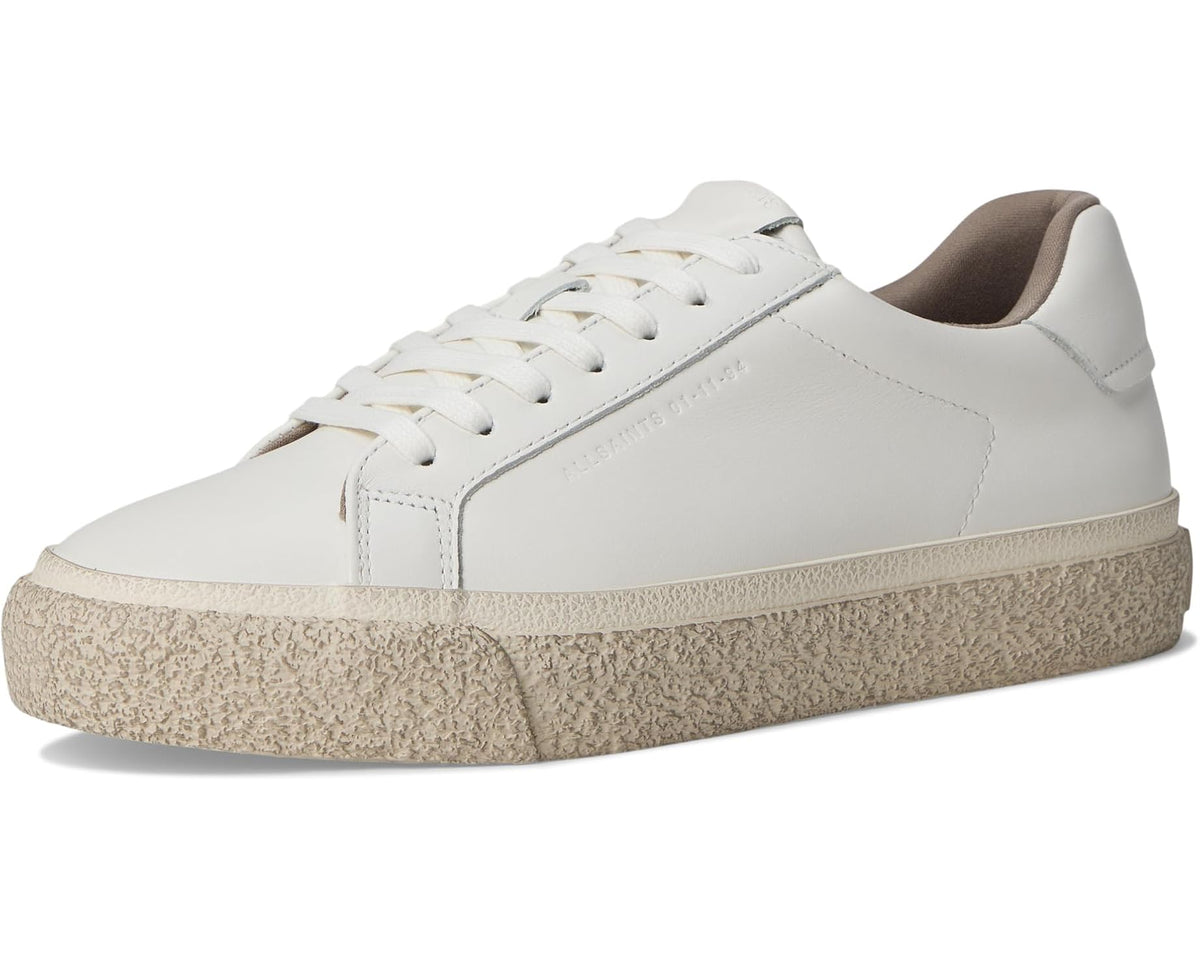 Men's white leather low-top sneakers, side view with brown collar lining
