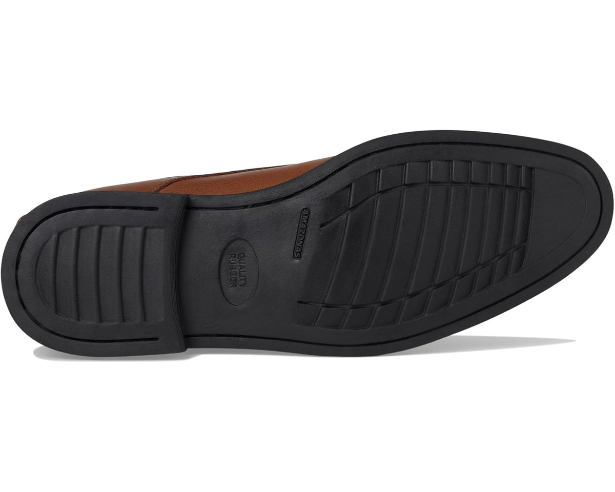 Men's cognac leather monk strap shoes, textured rubber sole and side profile