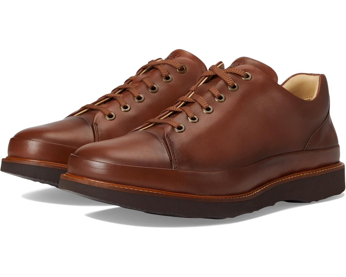 Cognac leather lace-up dress shoes with padded collar and rubber sole