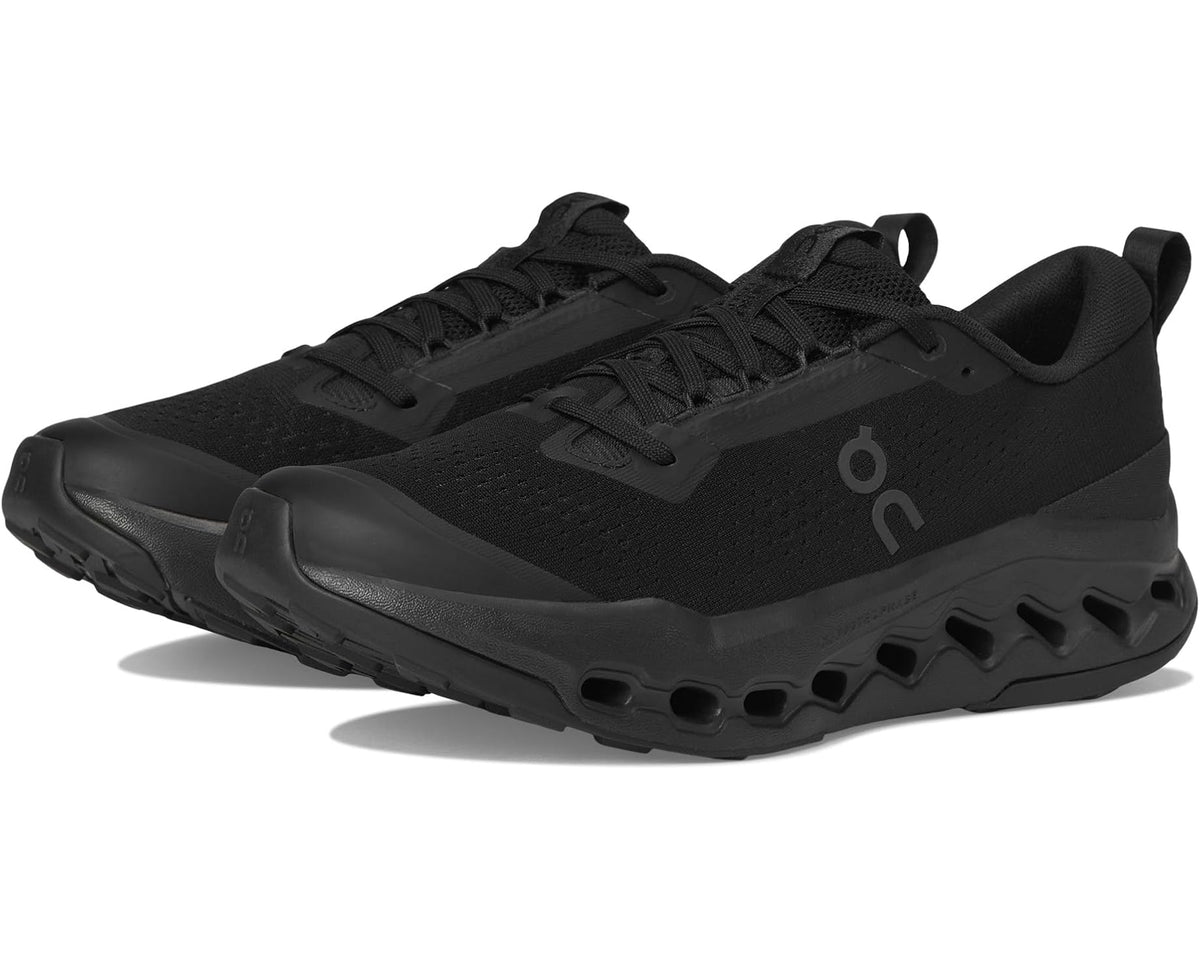 Black men's trail running shoe with lace-up front and cushioned sole pods