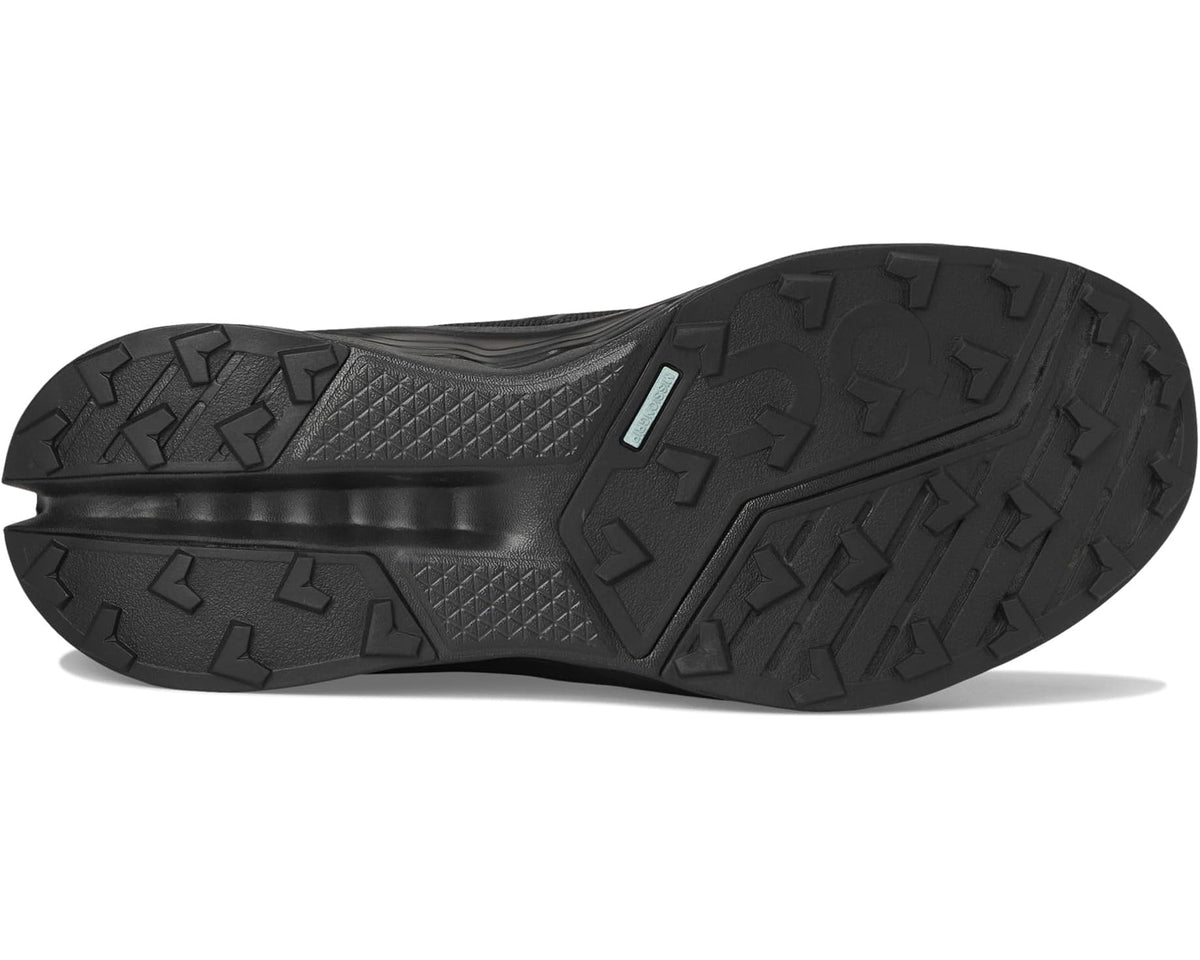 Black trail shoe outsole with rugged tread pattern and flex grooves