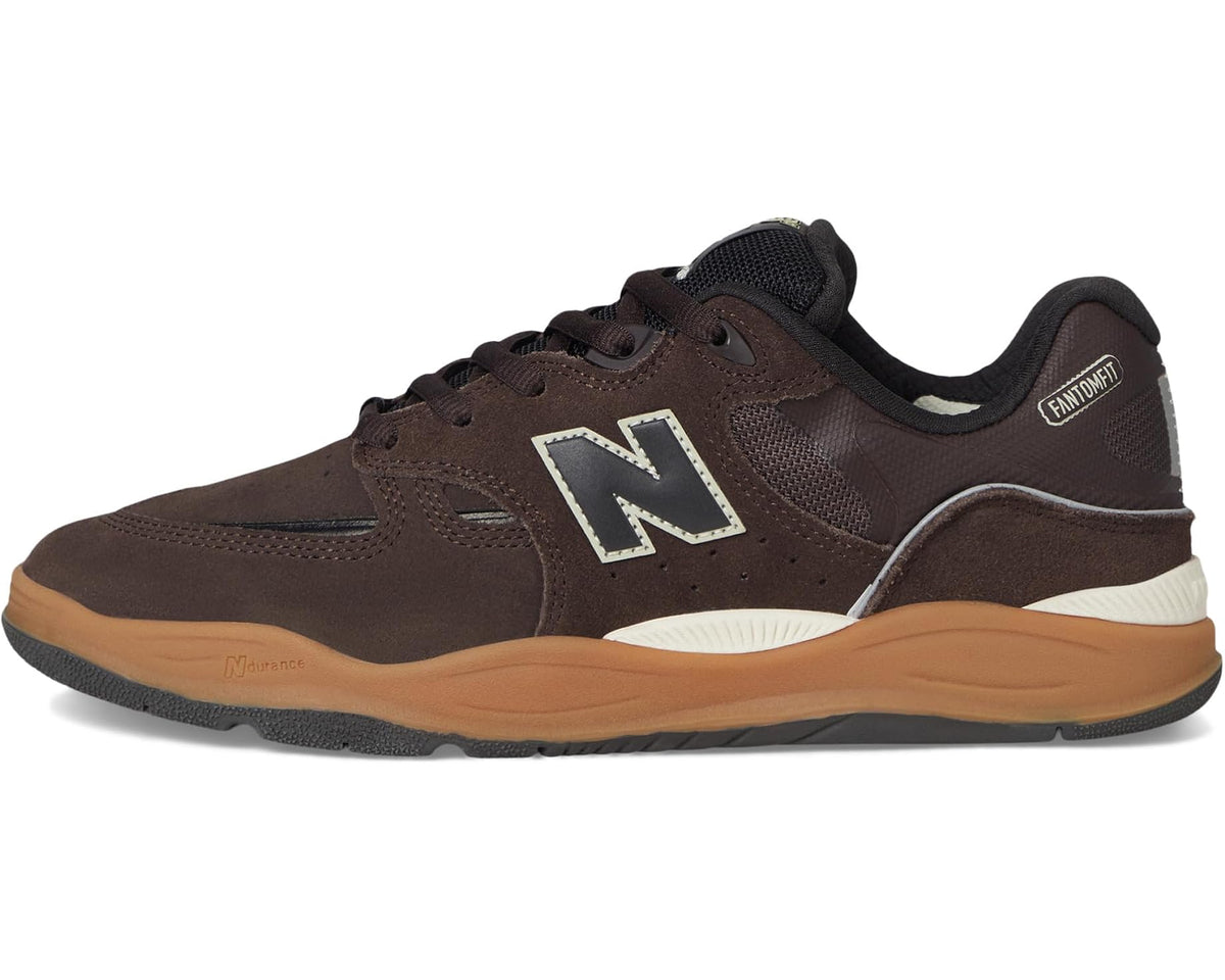 Brown New Balance 1010 skate shoe, lace-up with N logo, black collar, tan midsole.