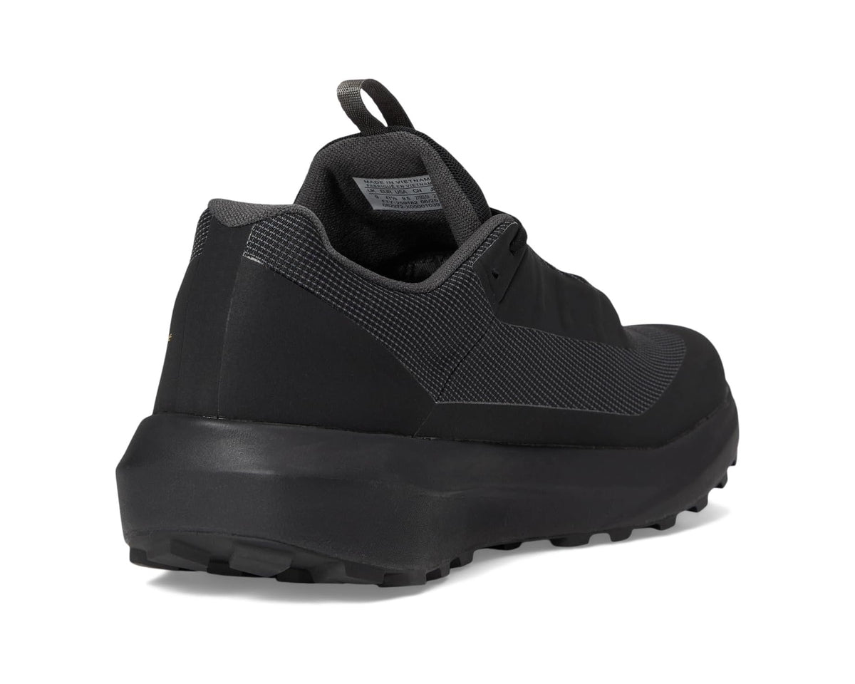 Unisex black trail shoe heel with pull tab and padded collar
