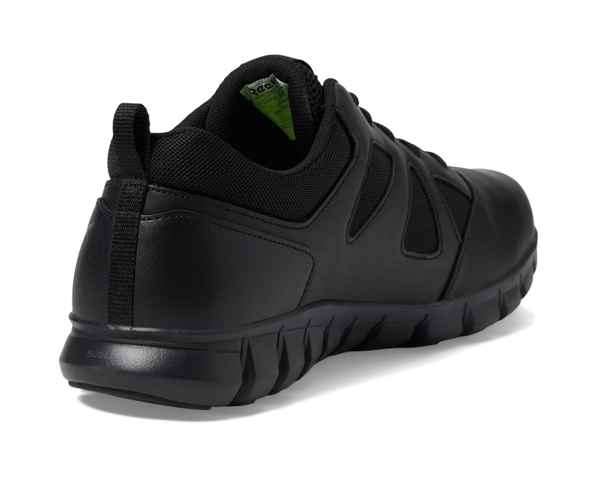 Black work shoes with heel tab, padded collar, and green-lined interior