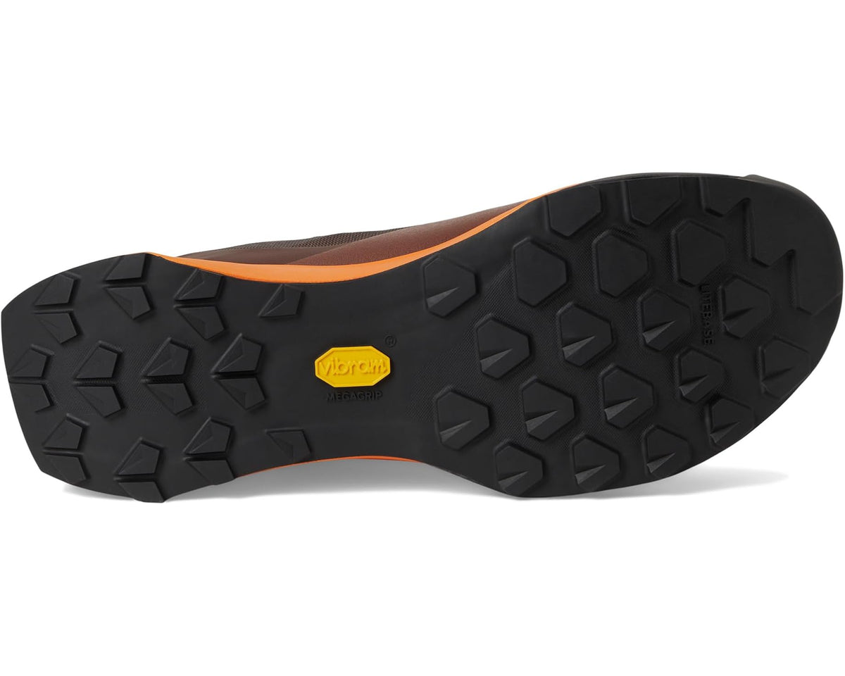 Men's Arc'teryx trail shoe outsole, black tread with orange accent and small logo